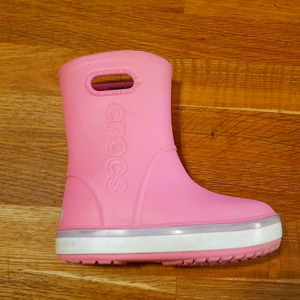 Pink Crocs rain boots, size 9